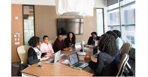 Black business women meeting conference table