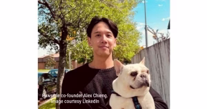 Pawsible Co-founder Alex Chieng holding dog